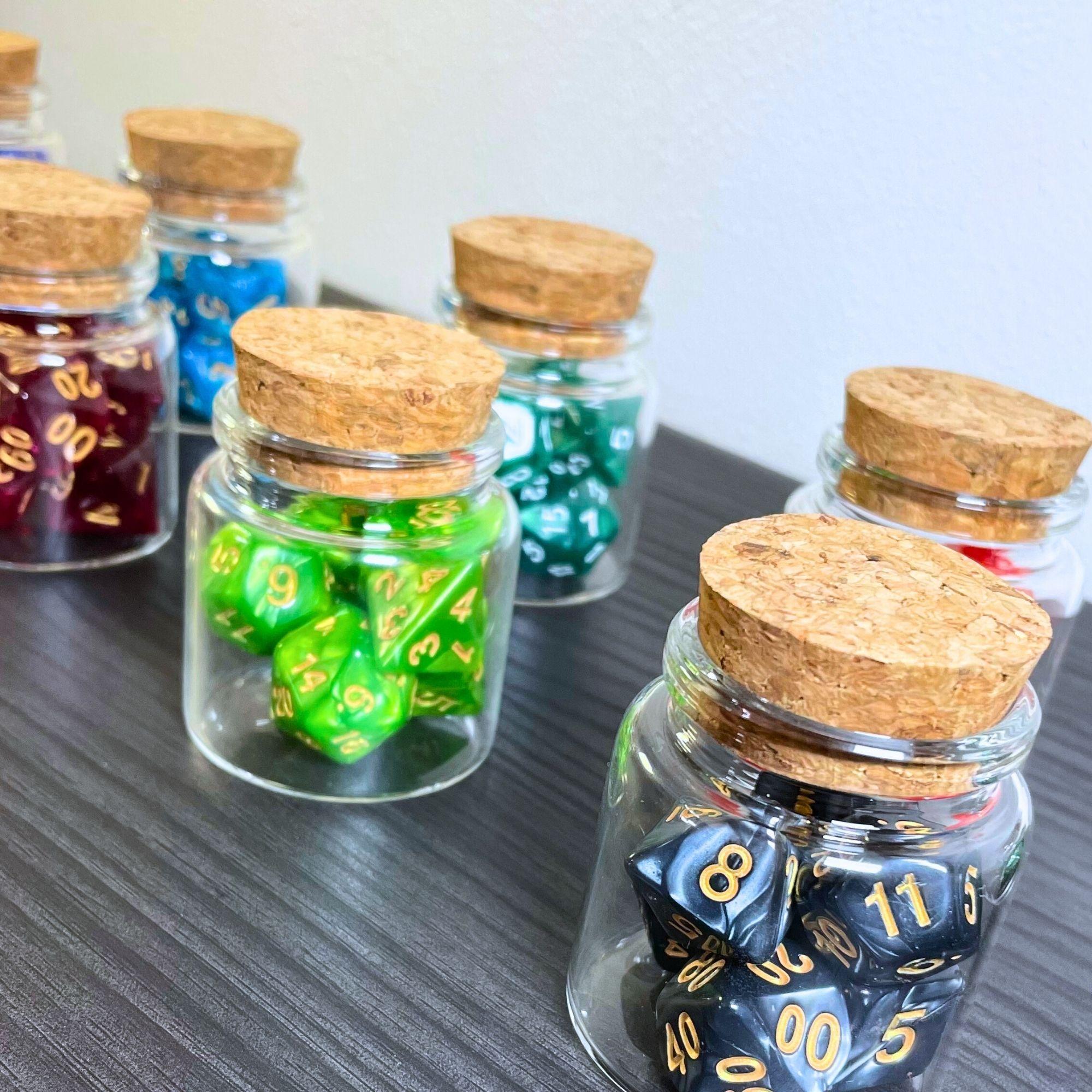 Dice Arcana collection — multiple themed dice bottles