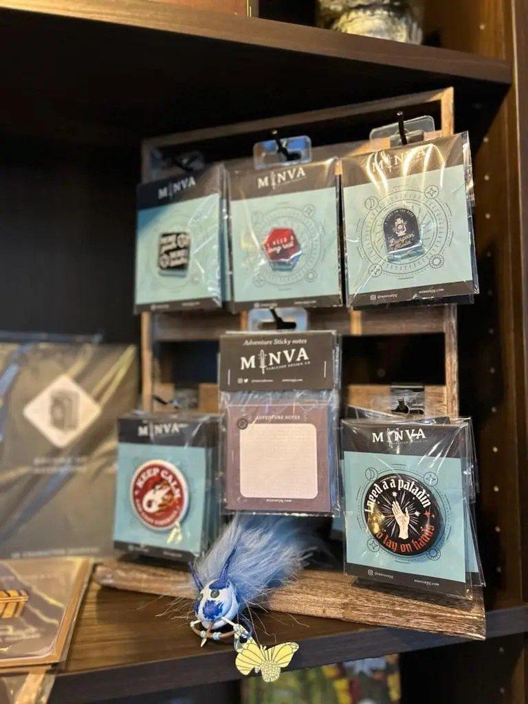 Minva acrylic and wooden pins on display at Moon Rabbit Collective
